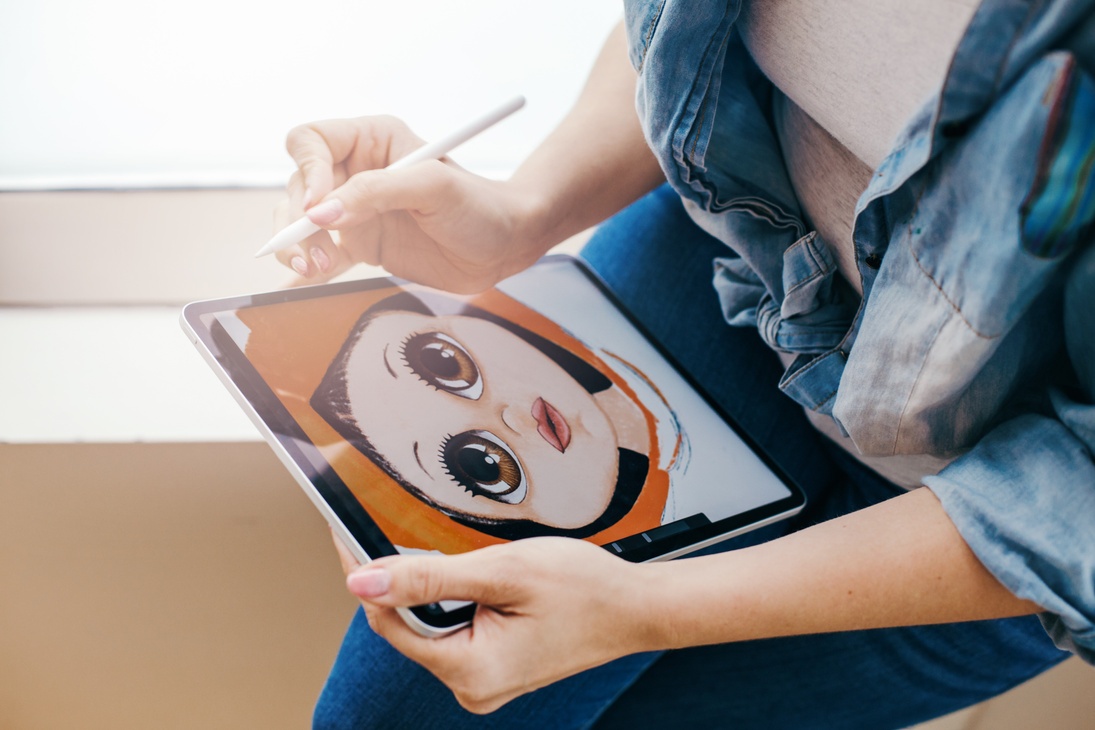 Woman Illustrating a Cute Portrait        